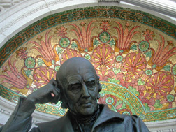 The restored head of Hahnemann's statue framed by the repaired mosaic.